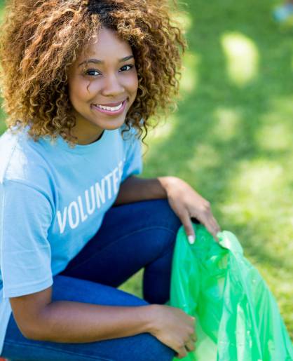 portrait-of-volunteer-woman-collecting-rubbish-in-2026-01-11-10-31-05-utc